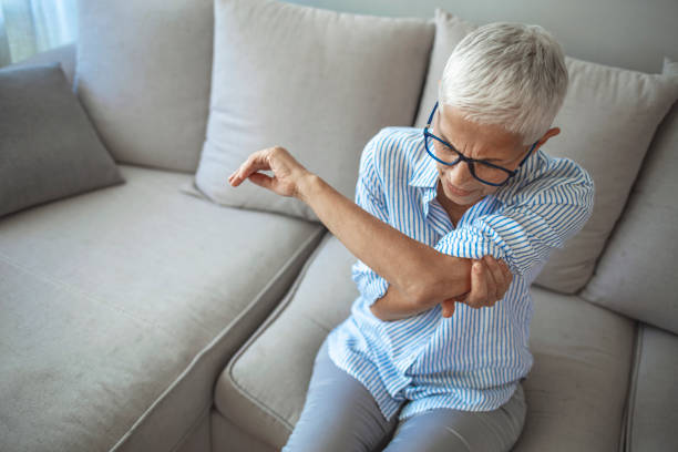 istock Elbow Pain In An Elderly Person 1277621907