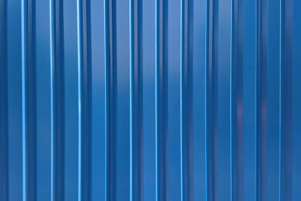 Blue metal corrugated wall, texture and pattern. stock photo