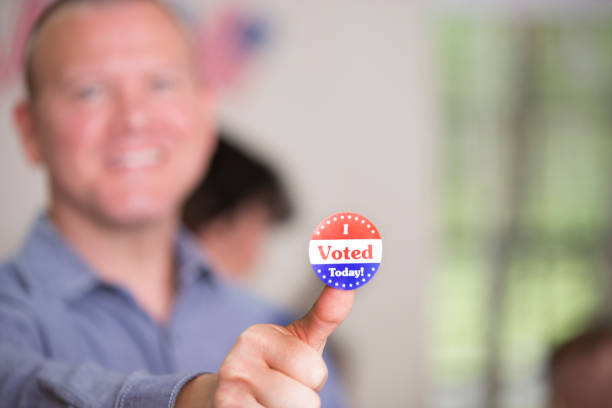 istock Voters at Polling Place 1277626806