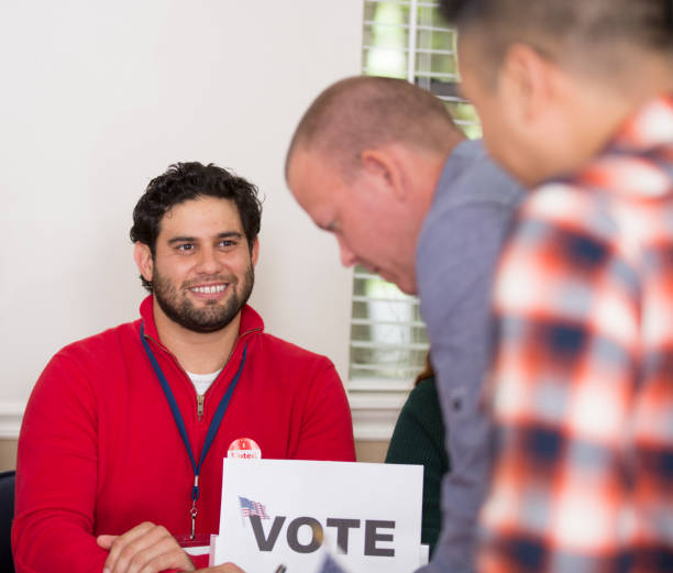 istock Voters at Polling Place 1277626818