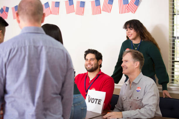 istock Voters at Polling Place 1277626832