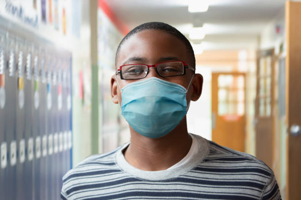 istock Student back to school wearing mask covid 19 1277628384