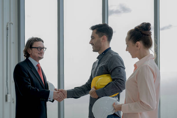 istock The engineering Team are hands shake after meeting to inspect the construction drawings, plan work and distribute work before starting the construction 1277632959