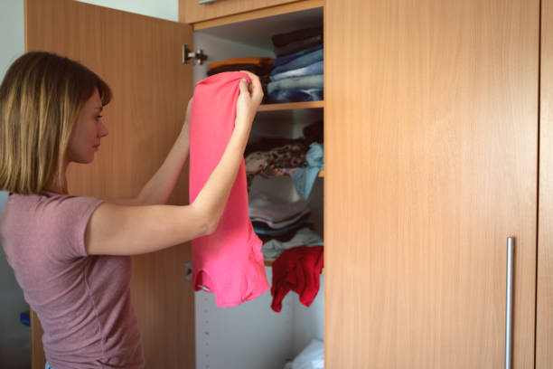 istock A woman arranging the closet 1277635985