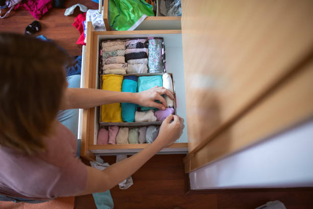 istock A woman arranging the closet 1277636051