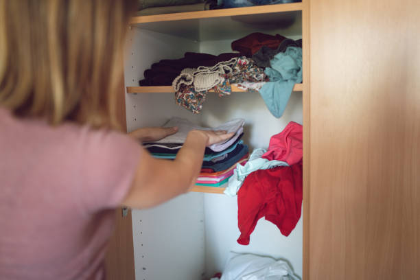istock A woman arranging the closet 1277636385