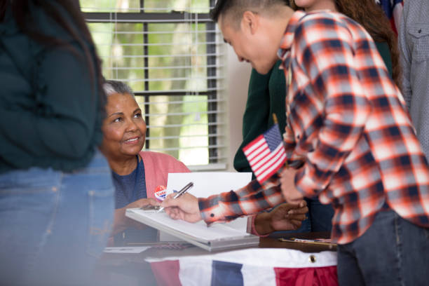 istock Voters at Polling Place 1277639810