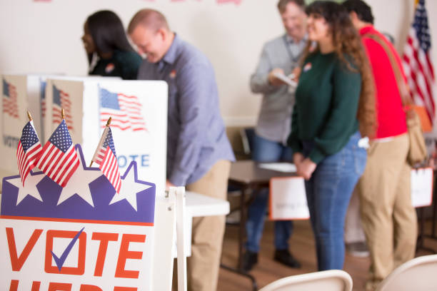 istock Voters at Polling Place 1277640906