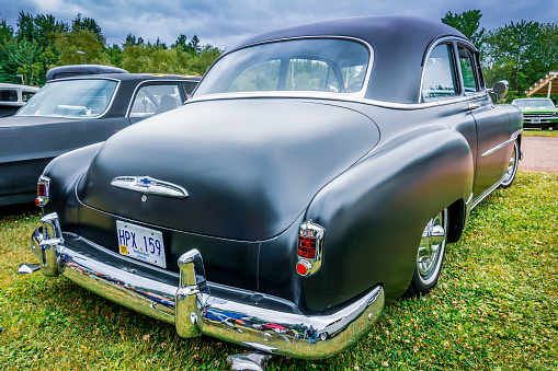 Moncton, New Brunswick, Canada - July 9, 2016 : 1951 Chevrolet Deluxe 2 door parked in Centennial Park during 2016 Atlantic Nationals, Moncton, New Brunswick, Canada.