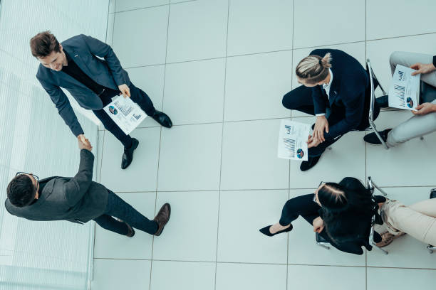 istock boss congratulates the employee on a good job 1277641602