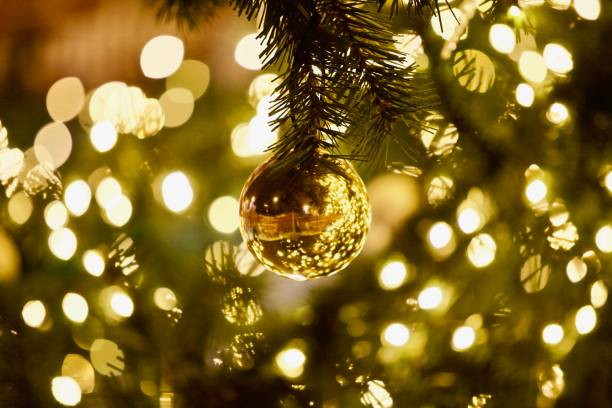istock Bright green Christmas tree decorated with beautiful colorful Christmas decorations 1277641656