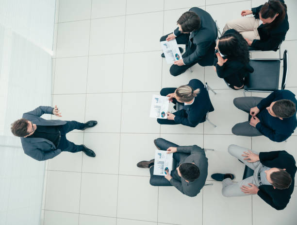 istock working group discussing a new strategy at an office meeting 1277641694