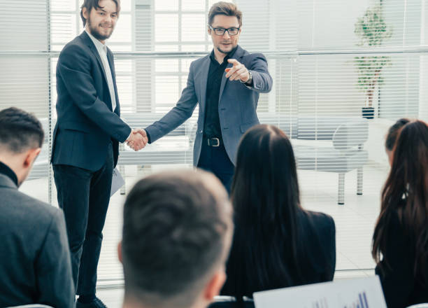 istock business colleagues shaking hands with each other 1277641714