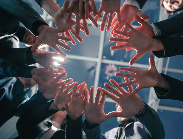 istock close up. young business team standing in a circle 1277642343