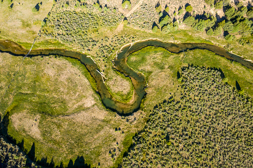 Image of a river in Wyoming at sunset seen from the air.