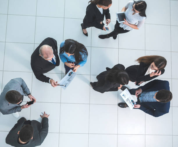 istock top view. a group of employees discussing financial data 1277646993