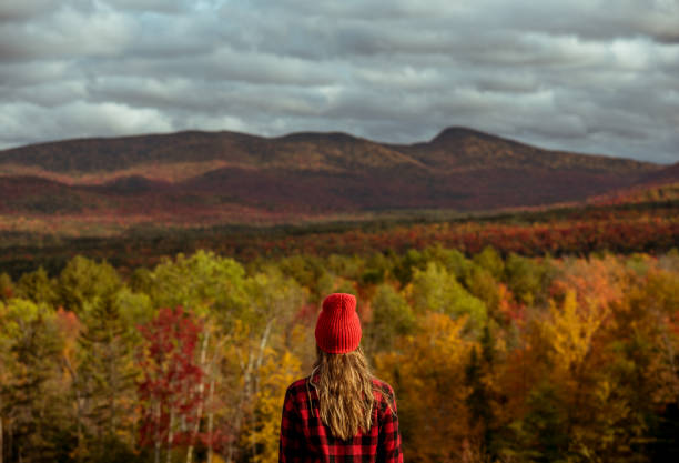 istock Female hiker surrounded by beautiful fall colors 1277648668