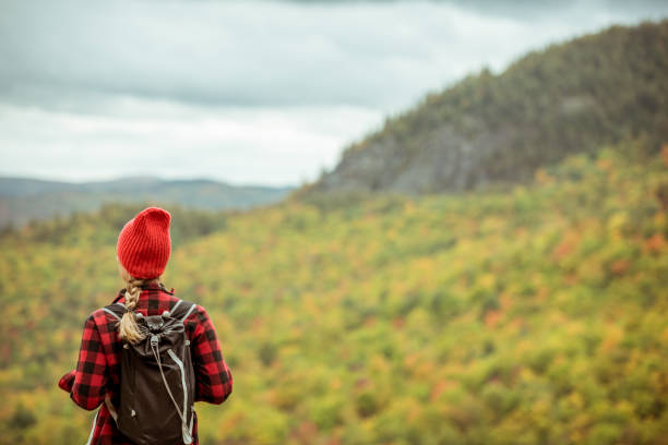 istock Female hiker surrounded by beautiful fall colors 1277649868