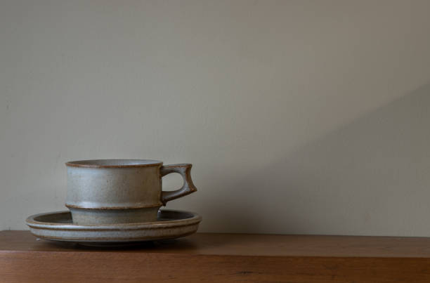 istock Ceramic mug handmade on the wooden shelf. 1277659685