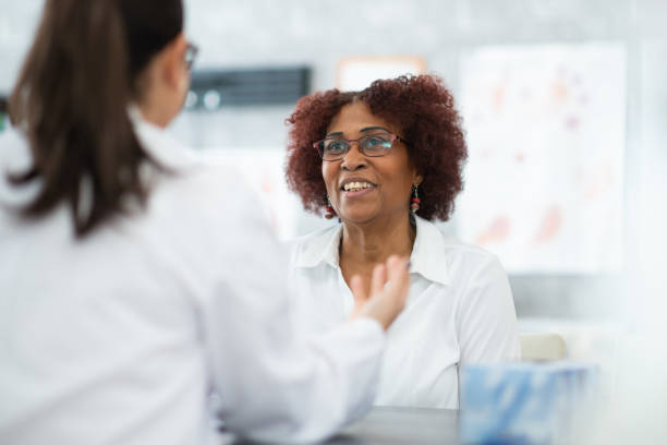 istock Senior consulting with doctor 1277661490
