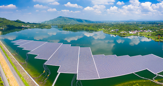 Aerial view of Floating solar panels or solar cell Platform system on the lake