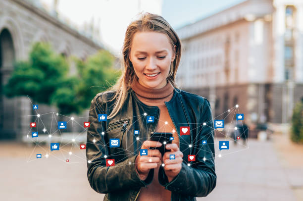 Staying connected. Shot of a beautiful young woman receives notifications on smart phone. Social media and digital online concept. Social media and people network technology concept. people sharing photos stock pictures, royalty-free photos & images