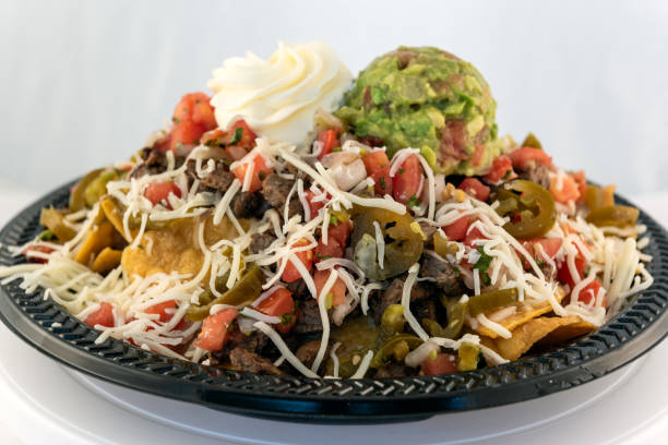 istock Vegan Nachos loaded and stacked with goodness. 1277667958