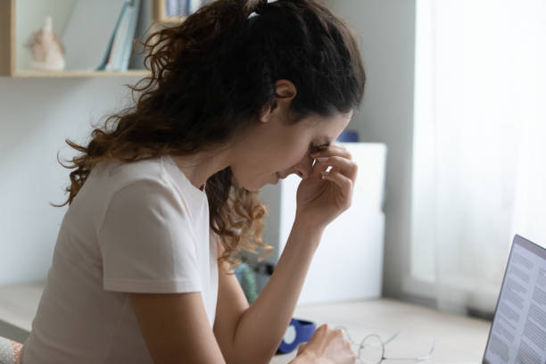 istock Tired woman massage eyes suffering from dizziness 1277668224