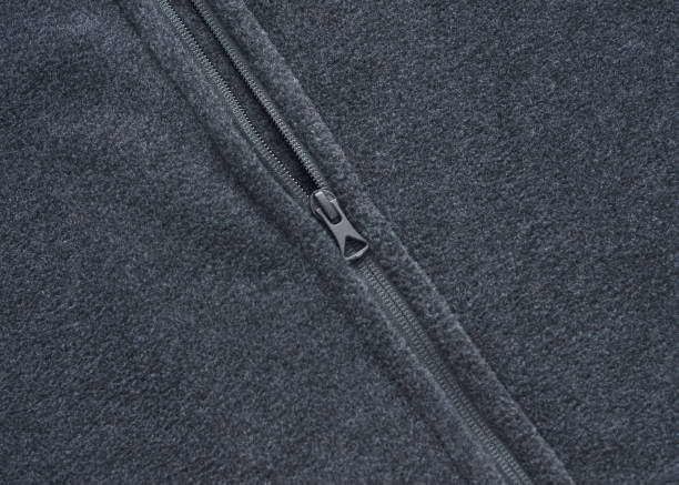 zipper on a fleece coat - velo casaco imagens e fotografias de stock