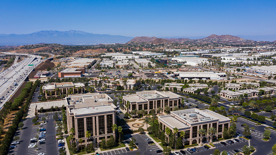 Daytime aerial view of the downtown center of Corona, California.