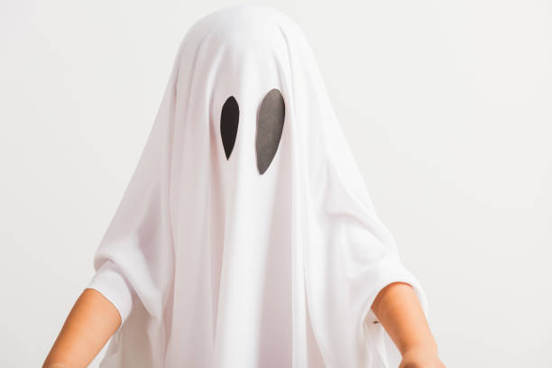 istock little cute child with white dressed costume halloween ghost scary 1277676671