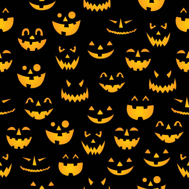 glühende kürbis gesichter nahtlose muster - patterned halloween background stock-grafiken, -clipart, -cartoons und -symbole
