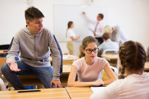 istock Teenage students talking during recess between lessons 1277681825