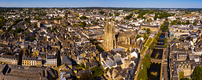 Aerial view of center of Quimper on banks of Odet River overlooking of Cathedral of Saint Corentin in summer, Finistere, France