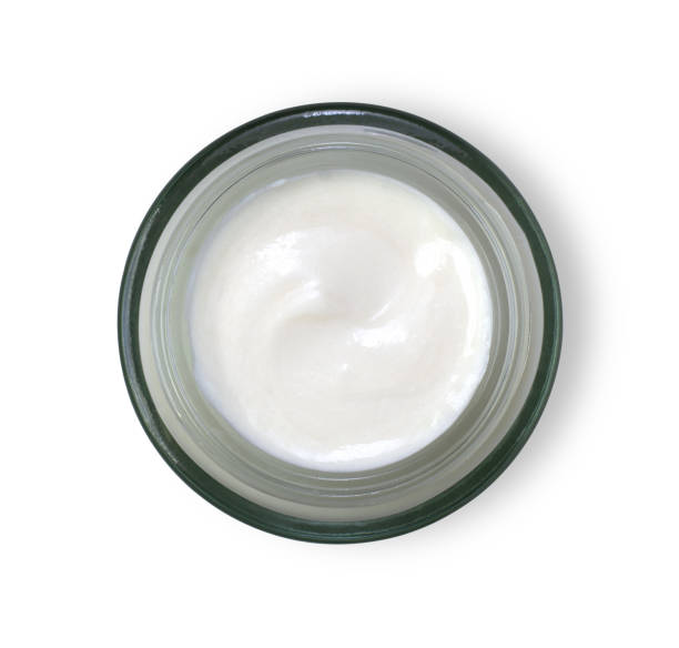 istock White beauty cosmetic cream in jar isolated on white .Top view. 1277686685