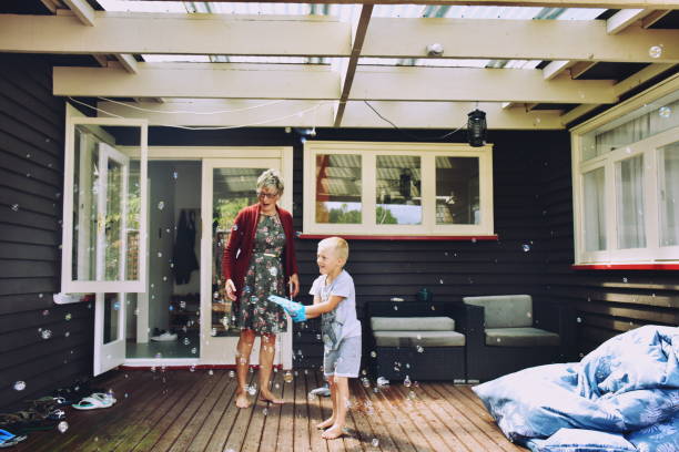 istock Child Showing Grandma his Bubbles 1277689087