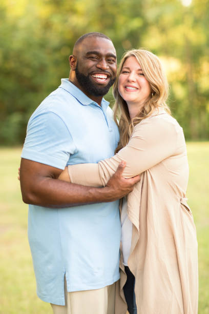 istock Loving mixed race couple hugging. 1277699281