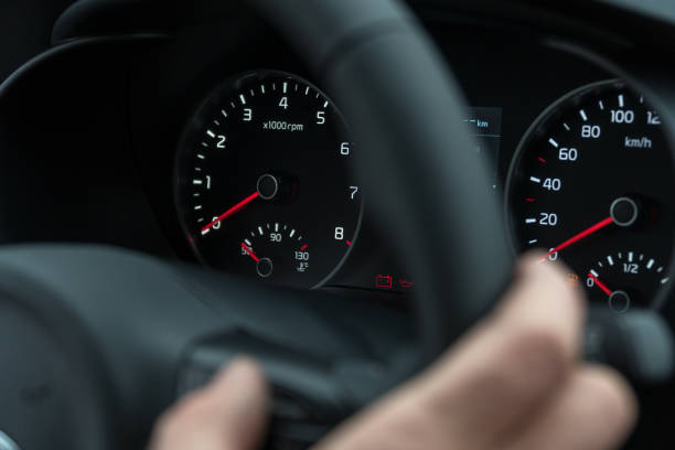 istock Speedometer in the car on the dashboard at night 1277702641
