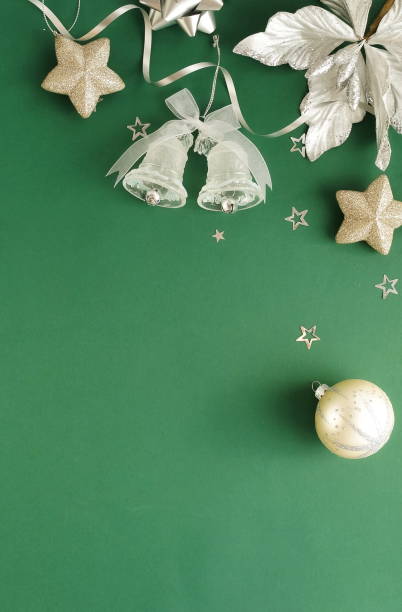 istock Christmas background . Xmas or new year decorations on green background with empty copy space for text. holiday concept for postcard or invitation. top view. 1277702762