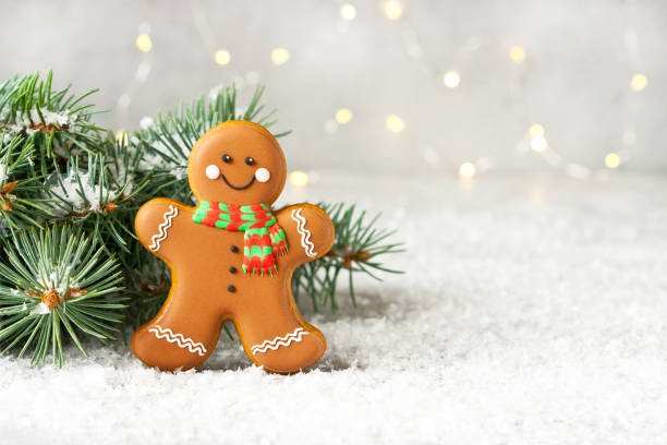 istock Christmas gingerbread  cookies  on snow background 1277703688