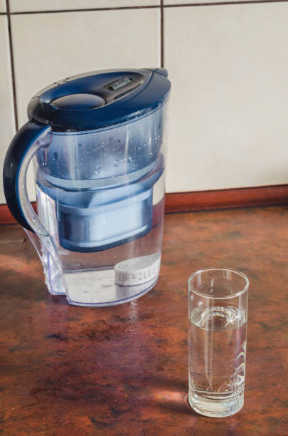 istock Water filter jug with shungite cartridge inside on the kitchen counter. 1277706768