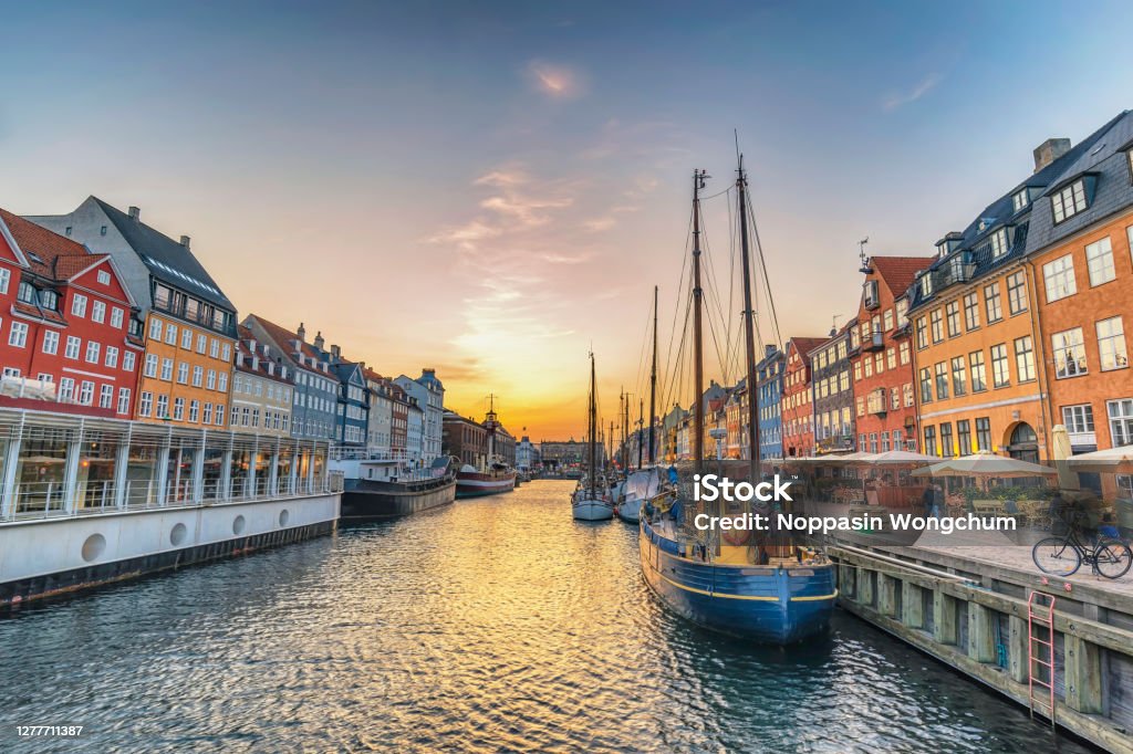 Copenhagen Denmark, sunset city skyline at Nyhavn harbour with colourful house Nyhavn Stock Photo