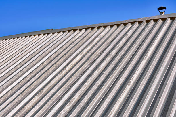 istock Metal Roof Blue Sky 1277712574