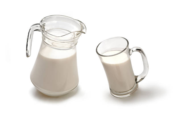 istock Glass and jar of milk 1277723885