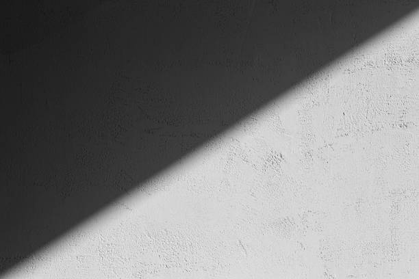 istock Shadows on the gray concrete wall from the sun. Shadow background. 1277723923
