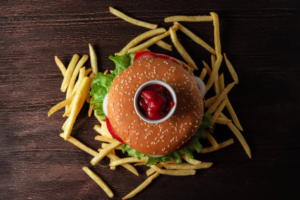 hamburger with French fries and sauce