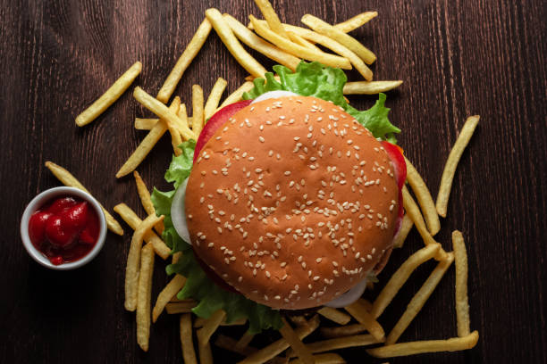 hamburger with French fries and sauce