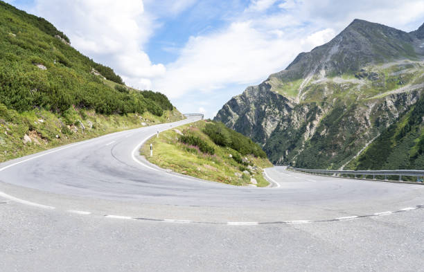 istock Mountain road with 180 degree turn 1277726754