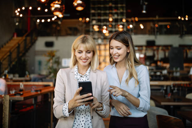 istock Business people having fun and chatting at workplace office 1277727251