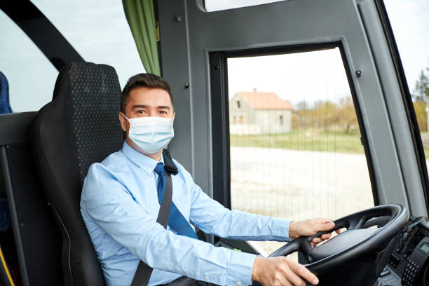 istock driver in medical mask driving intercity bus 1277728089